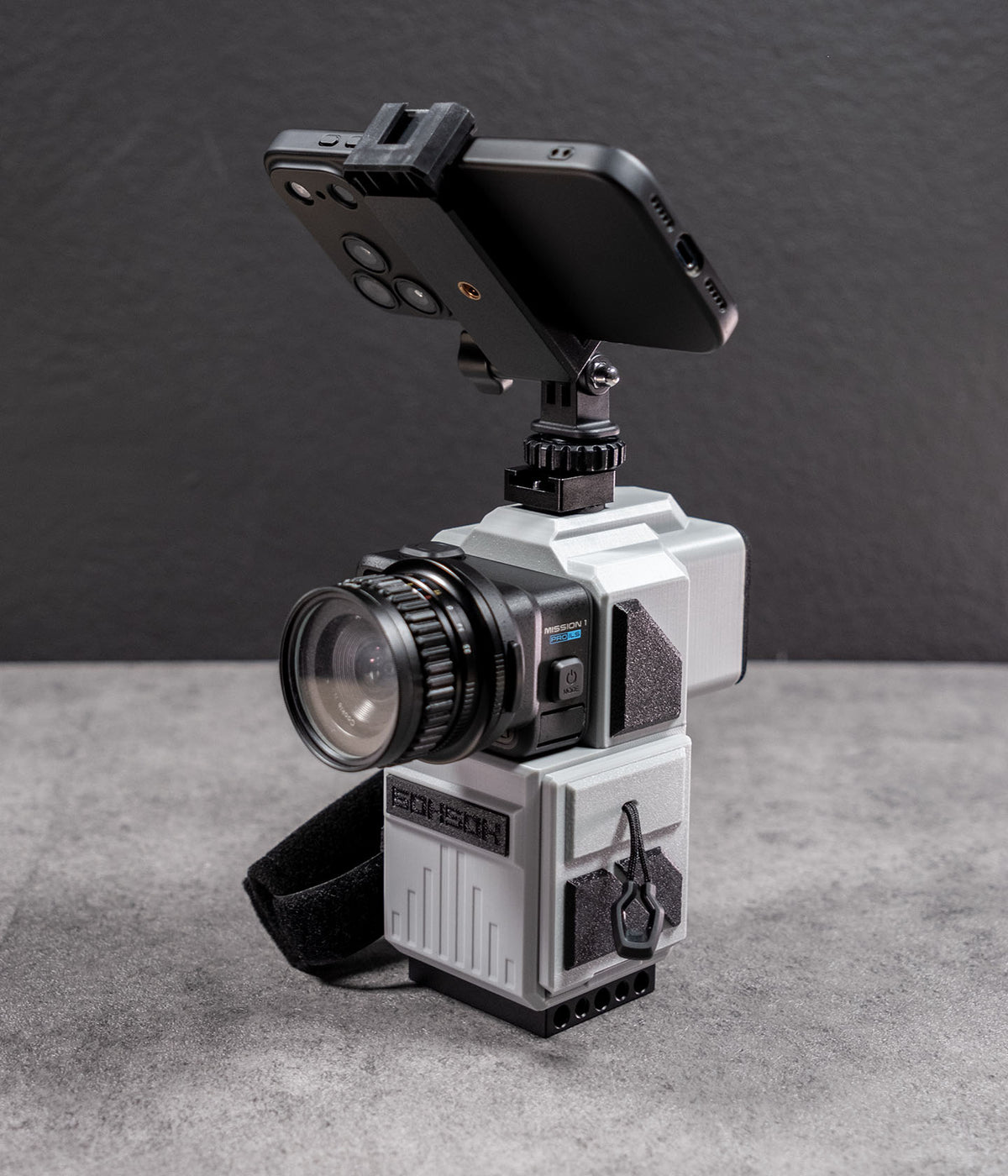 Mini 60 camera housing with smartphone mounted horizontally above the optical viewfinder