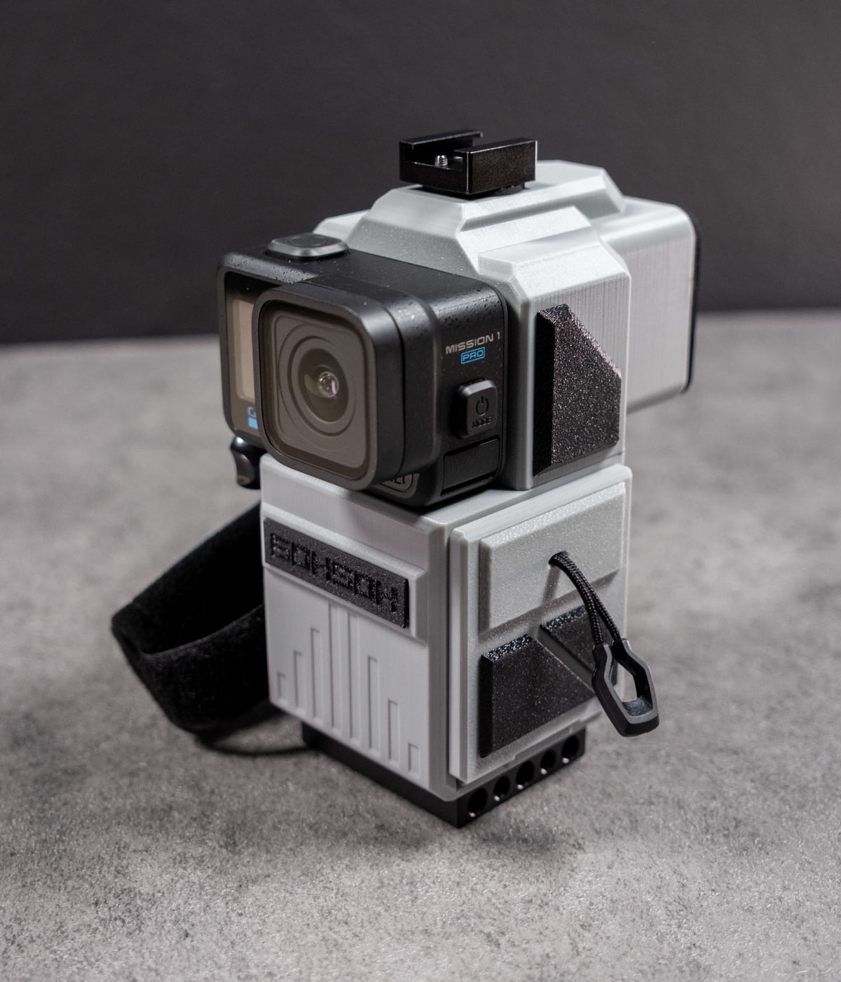 Mini 60 Handycam-inspired camera rig with GoPro Mission 1 installed