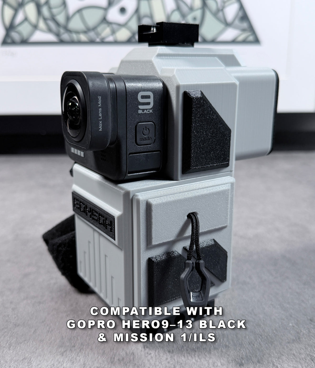 Mini 60™ 3D-printed camera cage with GoPro HERO9 Black and Max Lens Mod installed, showing compatibility with HERO9–13 Black and MISSION 1/ILS cameras.
