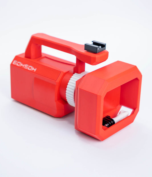 Mini VX Christmas Edition 3D-printed red action camera cage with top handle and VX-style front hood.