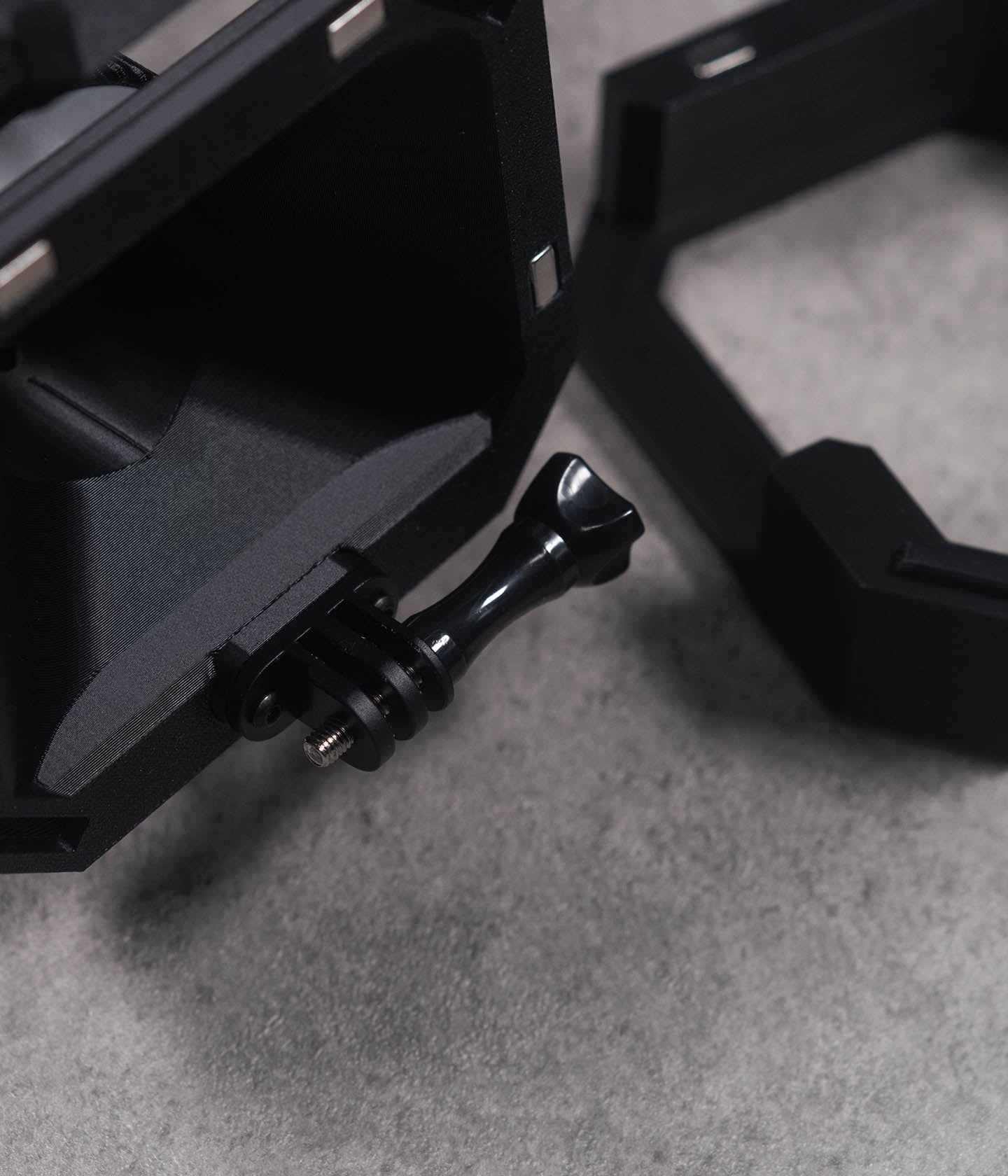 Close up of mounting screw for Mini VX™ 3D-printed action camera cage f