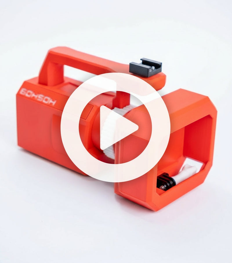 Mini VX Christmas Edition 3D-printed red action camera cage with top handle and VX-style front hood.